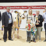 Intermediate Holstein Championship - Judge, Ashley Fleming, Richard Hamilton, IHFA President, Champion, Jones Lambda Twizzle exhibited by Jones Holsteins, Handler, Izzy Jones, with Ted and Rory Jones, Ursula Forrest Cork Holstein Friesian Breeders Club President, Sponsor, Brian Harte (Tom Harte Farm Services)